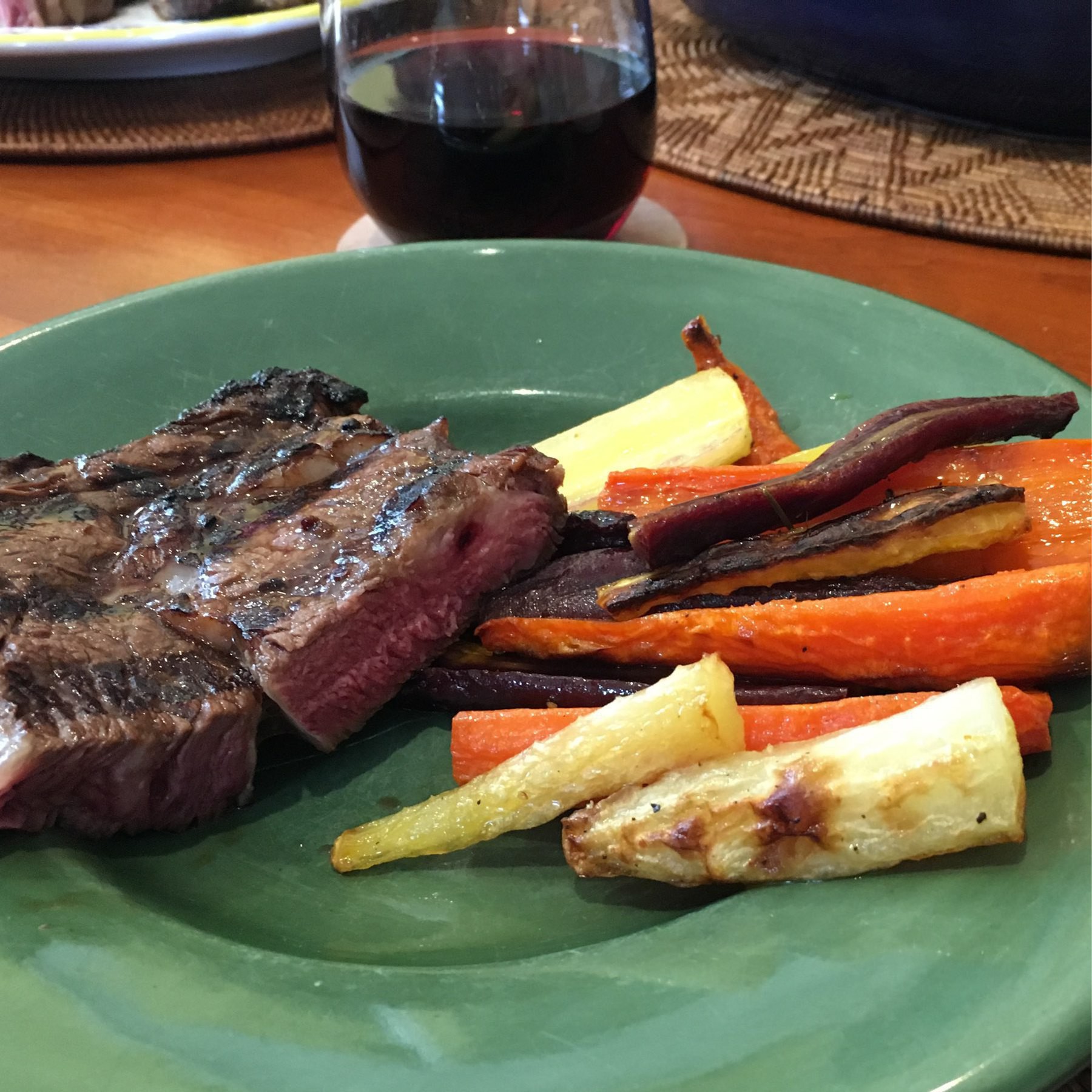 Grilled steak and roasted carrots, served