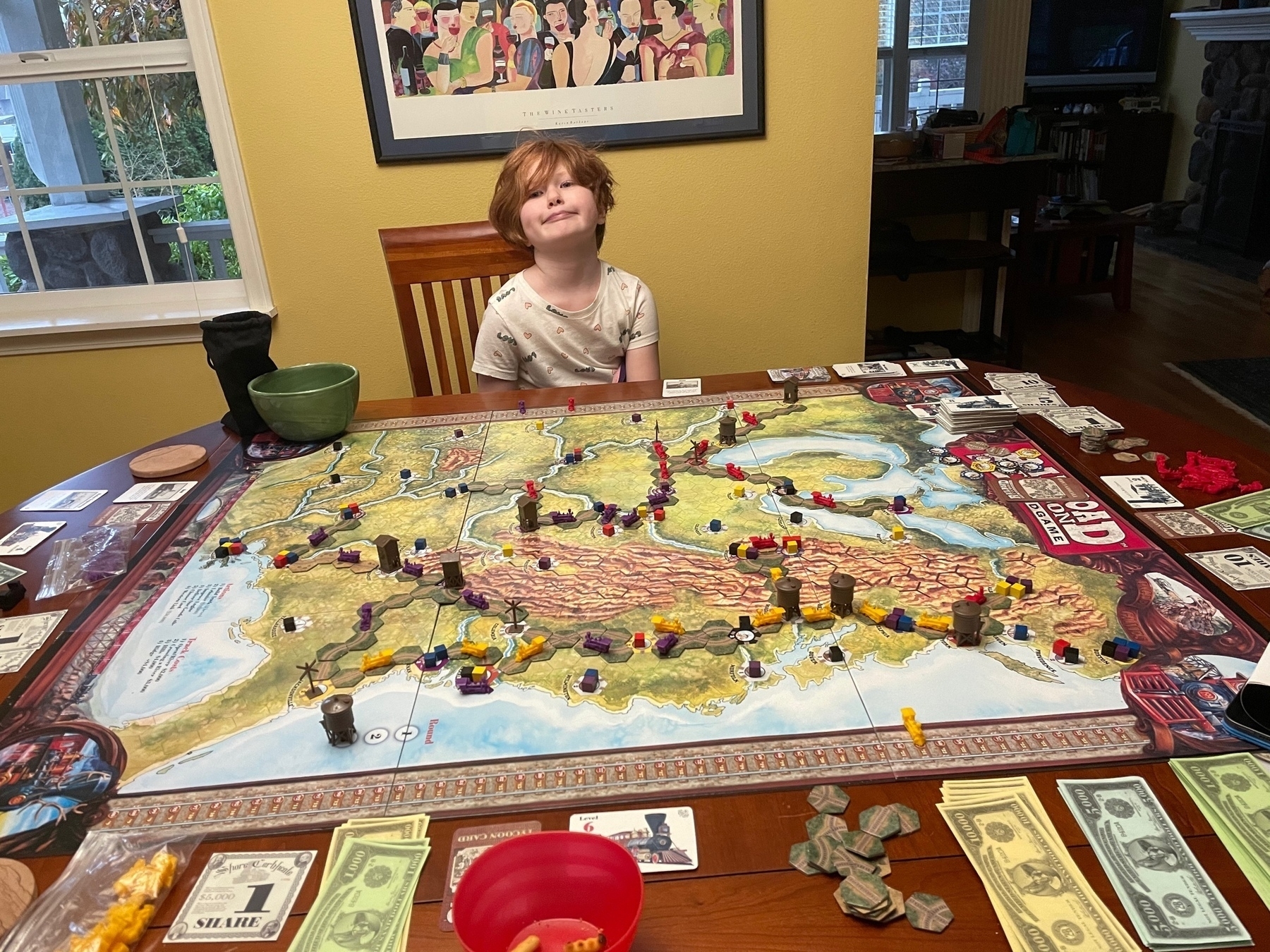 Daughter at Railroad Tycoon table, near completion