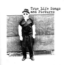 Album cover: Black and white photo of a person in a hat standing against a wall