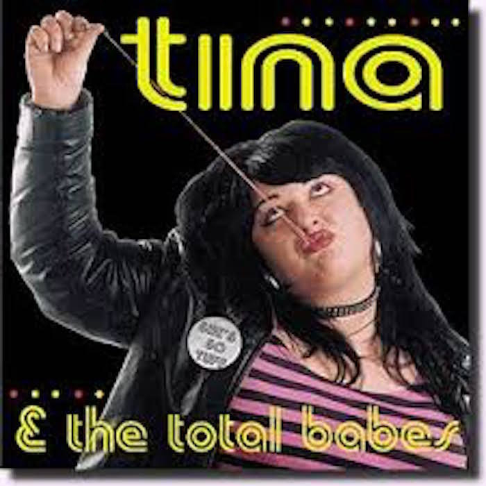 Album cover: Tina wearing a leather jacket, stretching bubble gum with a snotty attitude